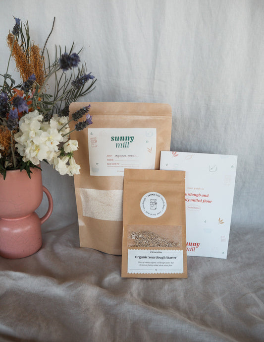 Sunny Mill Sourdough Starter pack with freshly milled flour, dehydrated sourdough starter and a guide